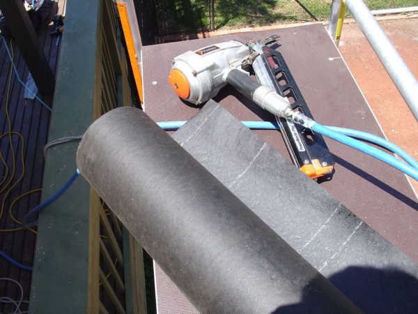 Asphalt saturated felt material to cover the entire outdoor patio roofing